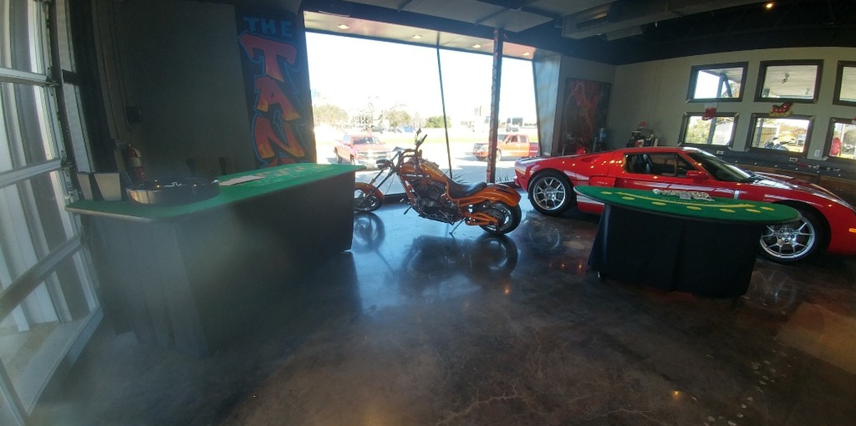 Private garage casino party setup with blackjack and roulette tables in Dallas, TX